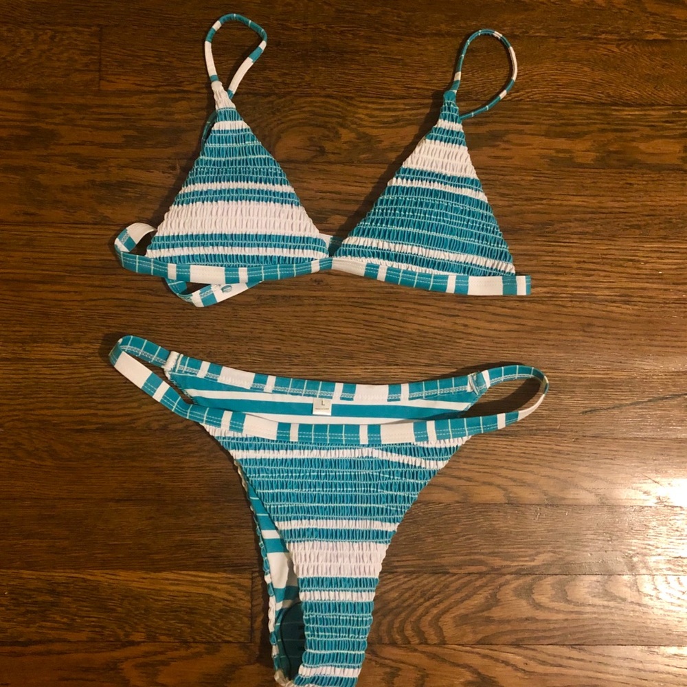 Adorable white and teal/blue swimsuit